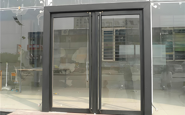 同心玻璃地弹门